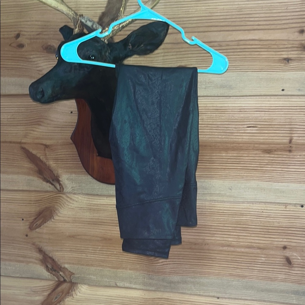 Black Leggings (snake skin fabric)   I wore them one time, very soft